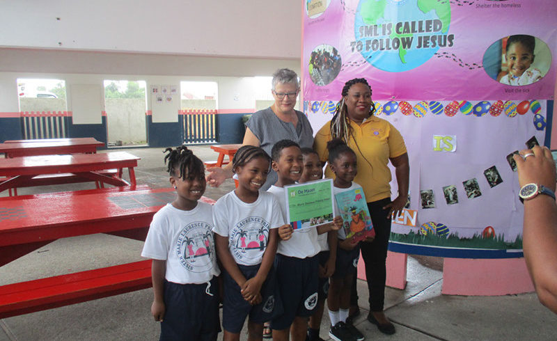 Former Philipsburg Jubilee Library Librarian’s Barbra & Archivist Julian Arrindell grandson’s presented $600,- to the Sister Marie Laurence School”